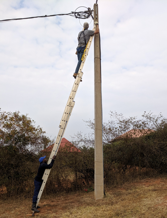Rafiki missionary Mike Koch makes repairs